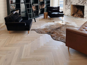 The Unique Beauty of a Wall-to-Wall Herringbone Floor